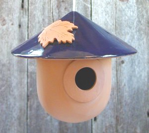 terra- cotta bird house china hat
